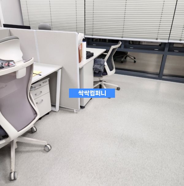 a room with desks and chairs